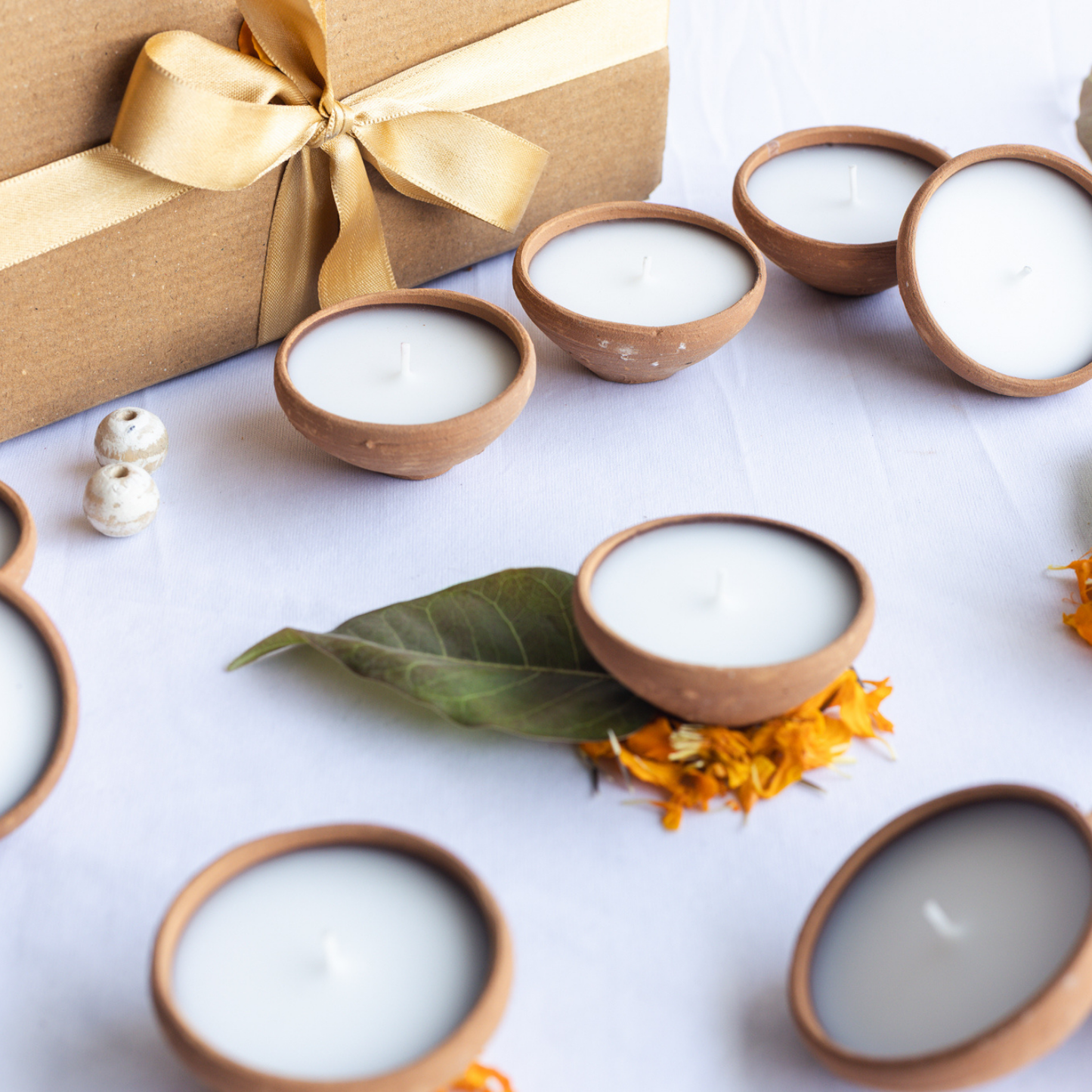 Set of 11 Unscented Wax filled Mitti Diyas